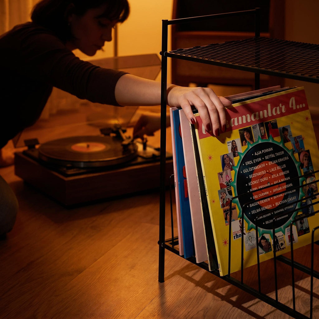 Black Metal Record Player Stand: Industrial Chic Vinyl Storage.